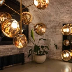 Tom Dixon Melt Chandelier Large 15 Tom Dixon Melt Chandelier Large -Artemide Store 008 Tom Dixon Melt Chandelier Large ambient 126312 Gold b176907951274db80667d8ba2da925e1