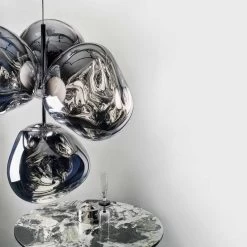 Tom Dixon Melt Chandelier Small -Artemide Store 010 Tom Dixon Melt Chandelier Small ambient 126309 Chrom bb35a09452900502a100a7f580e54c3a
